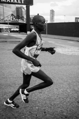 London, United Kingdom. 24 april, 2016. Kenyan athlete Dennis Kimetto running in Virgin Money London Marathon 2016.のeditorial素材