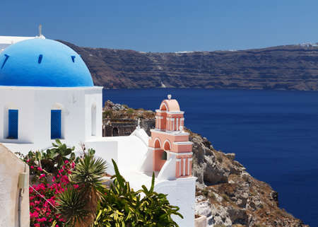 Beautiful view of famous Greek churches in the mediterranean island of Santorini.の写真素材