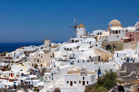 Beautiful view of Oia village in the mediterranean island of Santorini の写真素材