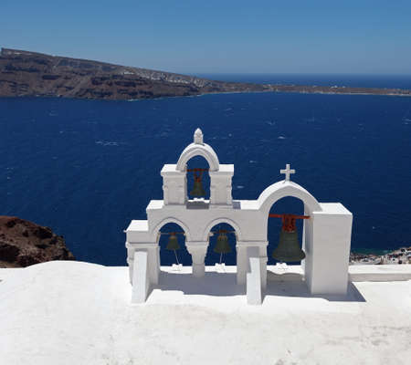 Beautiful view of famous Greek churches in the mediterranean island of Santorini の写真素材