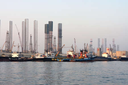 Oil rigs in the repair at the shore Sharjah United Arab Emiratesの写真素材