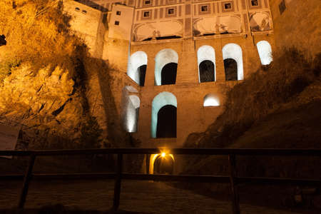 View of the Castle wing in Cesky Krumlov at night, the city is part of UNESCO heritage.の写真素材