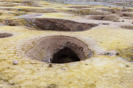Holes in the volcanic crater. Nisyros volcano, Greece.の写真素材