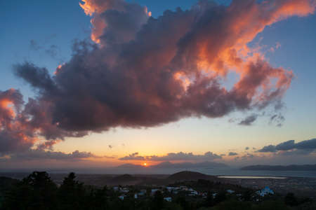 Sunset view with clouds and sun rays from Zia Village, in Kos Island, Greece.