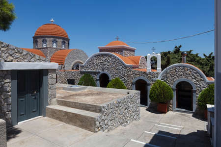 Beautiful Monastery of Agios Savvas located on top of a hill above Pothia Town, the capital of...