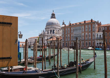 Venice with famous gondolas at midday, Italyの写真素材