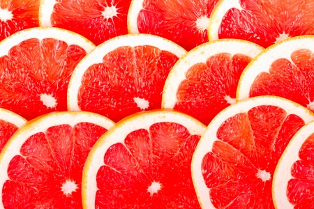 Background from the grapefruit cut by ringsの写真素材