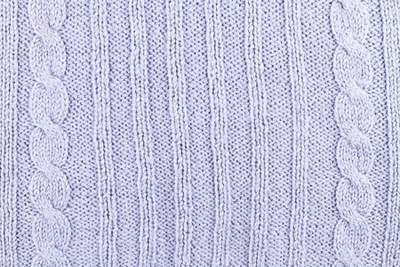 background from a woolen knitted fabric