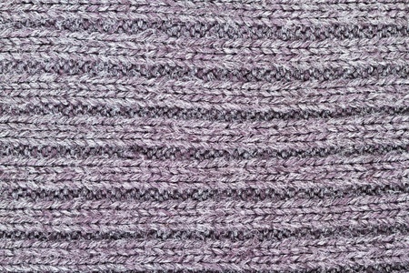 background from a woolen knitted fabricの写真素材