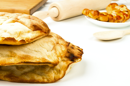 fresh pita bread isolated on white backgroundの写真素材