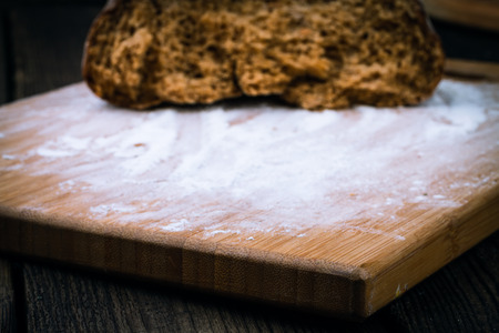 fresh white bread on wooden backgroundの写真素材