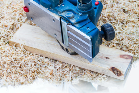 power planer on sawdust backgroundの写真素材