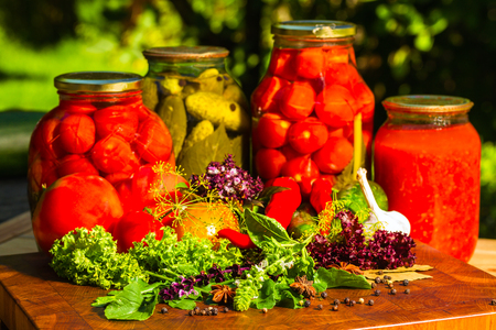 still life from marinated and fresh vegetables on the gardenの写真素材