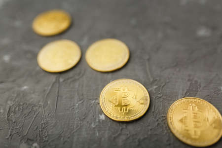 bitcoin on a gray background, coin bitcoin on the table, a lot of free spaceの写真素材