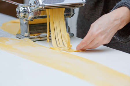 cooking homemade pasta, homemade noodles, housewife cooking food