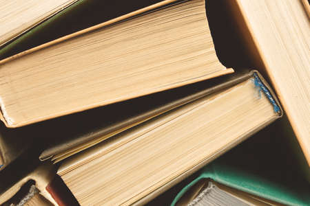 Old hardback books background. Top view. education background. Back to school. Copy space for text.