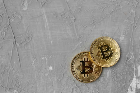 bitcoin on a gray background, coin bitcoin on the table, a lot of free spaceの写真素材