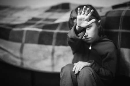 stop hand of child, sign of discrimination or anti violence symbol. Stop abusing violence. Child bondage, violence, terrified, fearful child, Human Rights Day concept. black and white.の写真素材