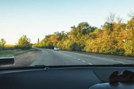 Journey, road early in the morning with sunlight, sunset