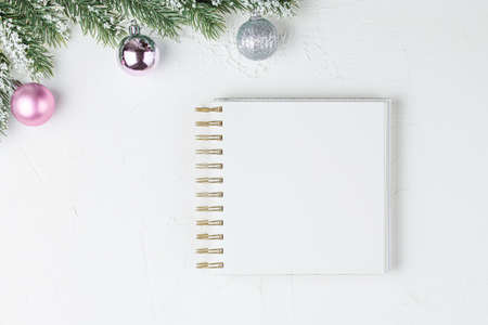 schoole notepad on white background with gifts, holiday concept flat lay. new goals, plans and to do...