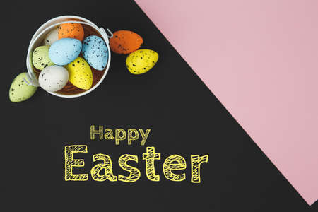 colored sheets of pink and blue, a holiday note for Easter with colored eggs