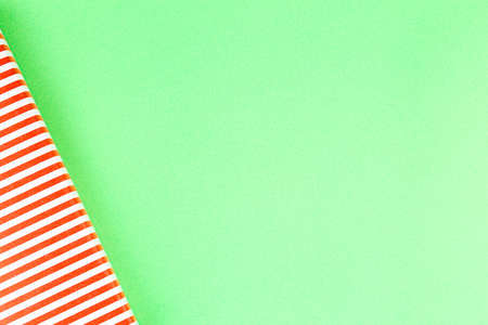 Empty green background with a red striped box. christmas concept.