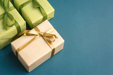 gifts on a dark background lined, top view on a gift box, flat layの写真素材