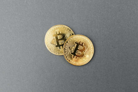 bitcoin on a gray background, coin bitcoin on the table, a lot of free spaceの写真素材