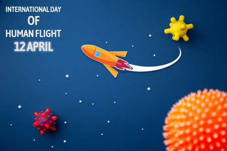 International day of human space flight. 12 April World Cosmonautics Day. Launch rocket journey to the stars on a blue isolated background.の写真素材