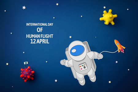 International day of human space flight. 12 April World Cosmonautics Day. Astronaut explores space on a blue isolated background. The concept of distant galaxies and deep space.の写真素材