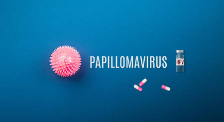 Human papilloma virus concept. Abstract strain model on blue background flat lay. Virus Pandemic Protection Concept. Pathogen organism, infectious micro virology. Horizontal photo. Top view.の写真素材