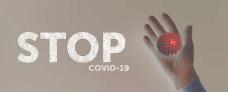 hand in medical gloves shows the virus. stop covid-19, coronavirus control concept, Horizontal banner.の写真素材