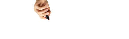 hand with marker writes on top on isolated white background. Writing hand. Hand holding black Pen. Wide image.の写真素材