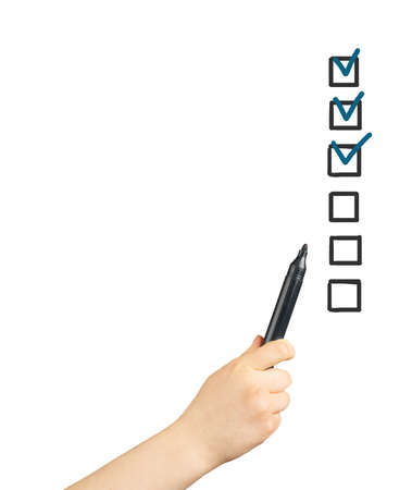 Hand with pen and checklist on white isolated background. Fill form concept. Modern flat design concept for school tests and questions, infographics. Male hand filling tax form.の写真素材