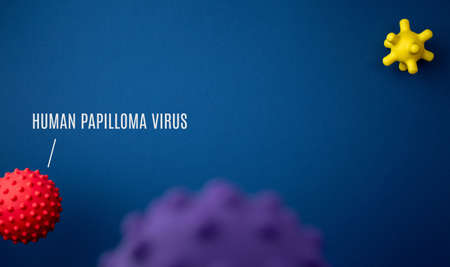 Human papilloma virus concept. Abstract strain model on blue background flat lay. Virus Pandemic Protection Concept. Pathogen organism, infectious micro virology. Top view with copyspace.の写真素材