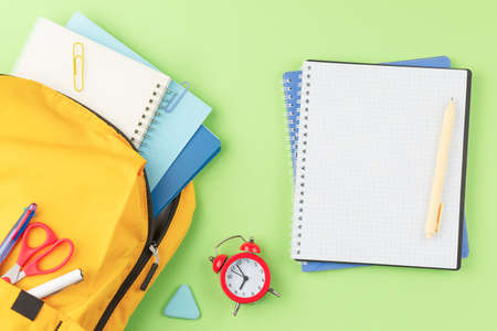 School backpack with educational supplies.の写真素材