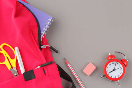 School backpack with educational supplies.の写真素材