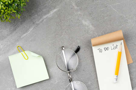 Open notepad on marble background.の写真素材