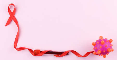 Red ribbon. Cancer control symbol.の写真素材