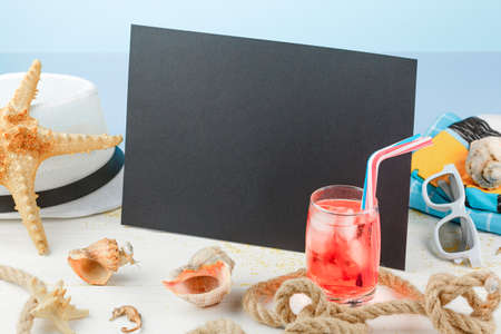 Chalk board with beach summer accessories.の写真素材