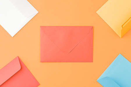 mailing envelopes on orange background.の写真素材