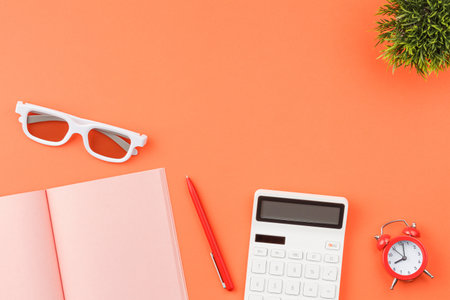 Piggy bank with calculators office desk top view.の写真素材