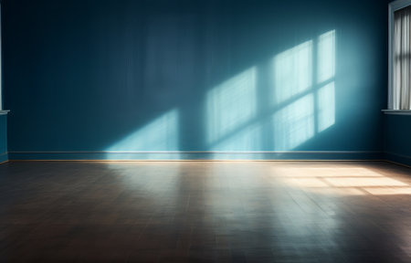 empty room interior with sunlight coming through the window and shadow lighting with spotlight, showroom studio with wooden floor and blue wall, minimal concept, by ai generativeの素材