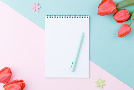 White sheet notepad with pen.の写真素材