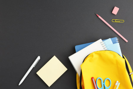 Yellow backpack collected for school.