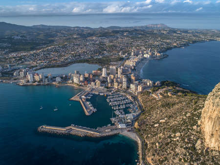 Aerial photo of costal town with view point from the Peの写真素材