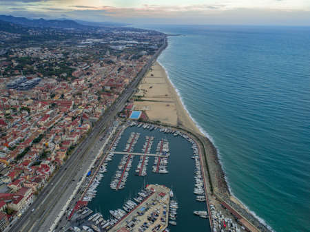 Aerial photo of sea port and a yacht club of Montgat at sunset, east of Barcelona, Spain. 2の写真素材