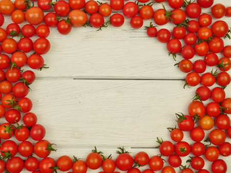 Frame, pattern of cherry Tomatoes fresh, on a white background, close-up, diet food. Agricultureの写真素材