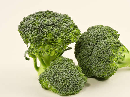 Broccoli cabbage, fresh, green. Isolated on a white background. Good nutrition. Close up. Macrophotography.の写真素材