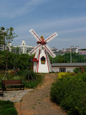 This windmill in the yard creates a sense of the fairy tale in the modern cityのeditorial素材